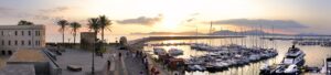 Alghero, Italy - Panoramic view of the Alghero historic quarter and marina with St. Elm Tower